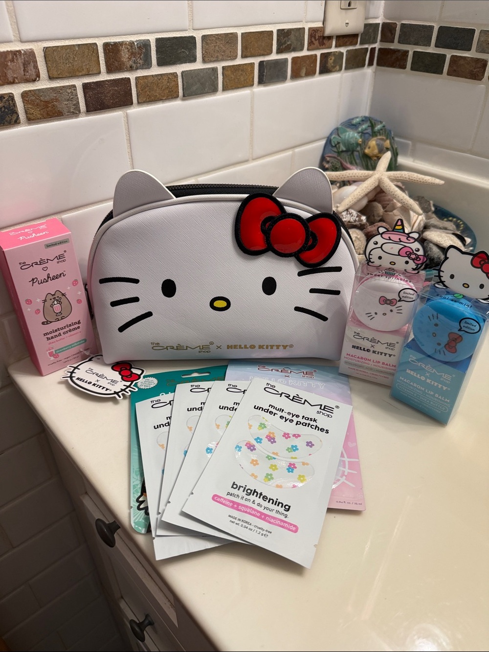 The crème shop x Hello Kitty White Cosmetic Bag with Red Bow bundle